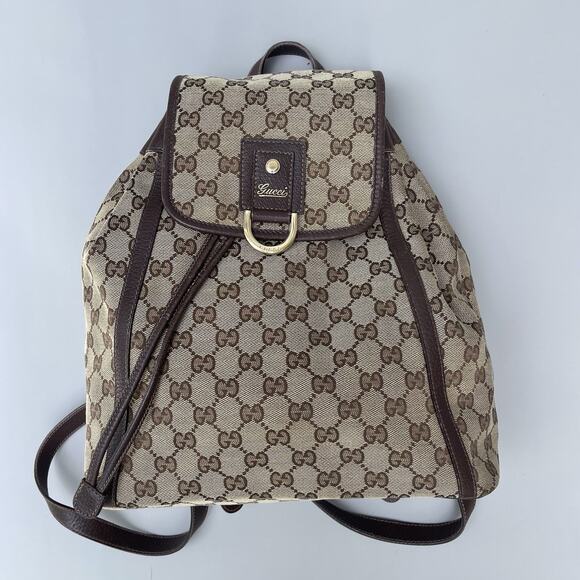 Gucci Abbey Brown Monogram Flap Backpack Cinch Closure ￼ - Picture 1 of 16